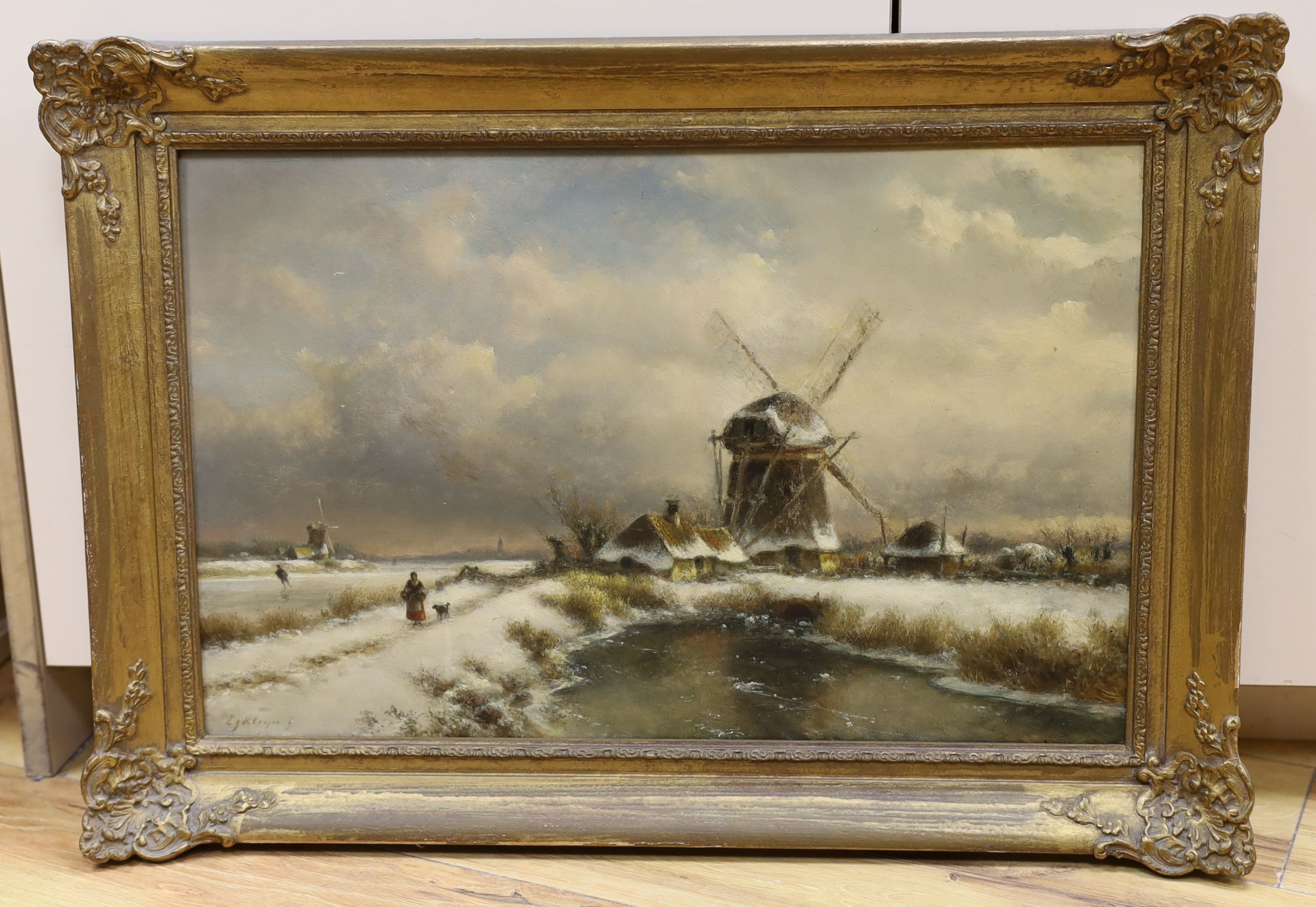 Lodewijk Johannes Kleijn (1817-1897), oil on wooden panel, Winter scene with a windmill, signed, 33 x 51cm